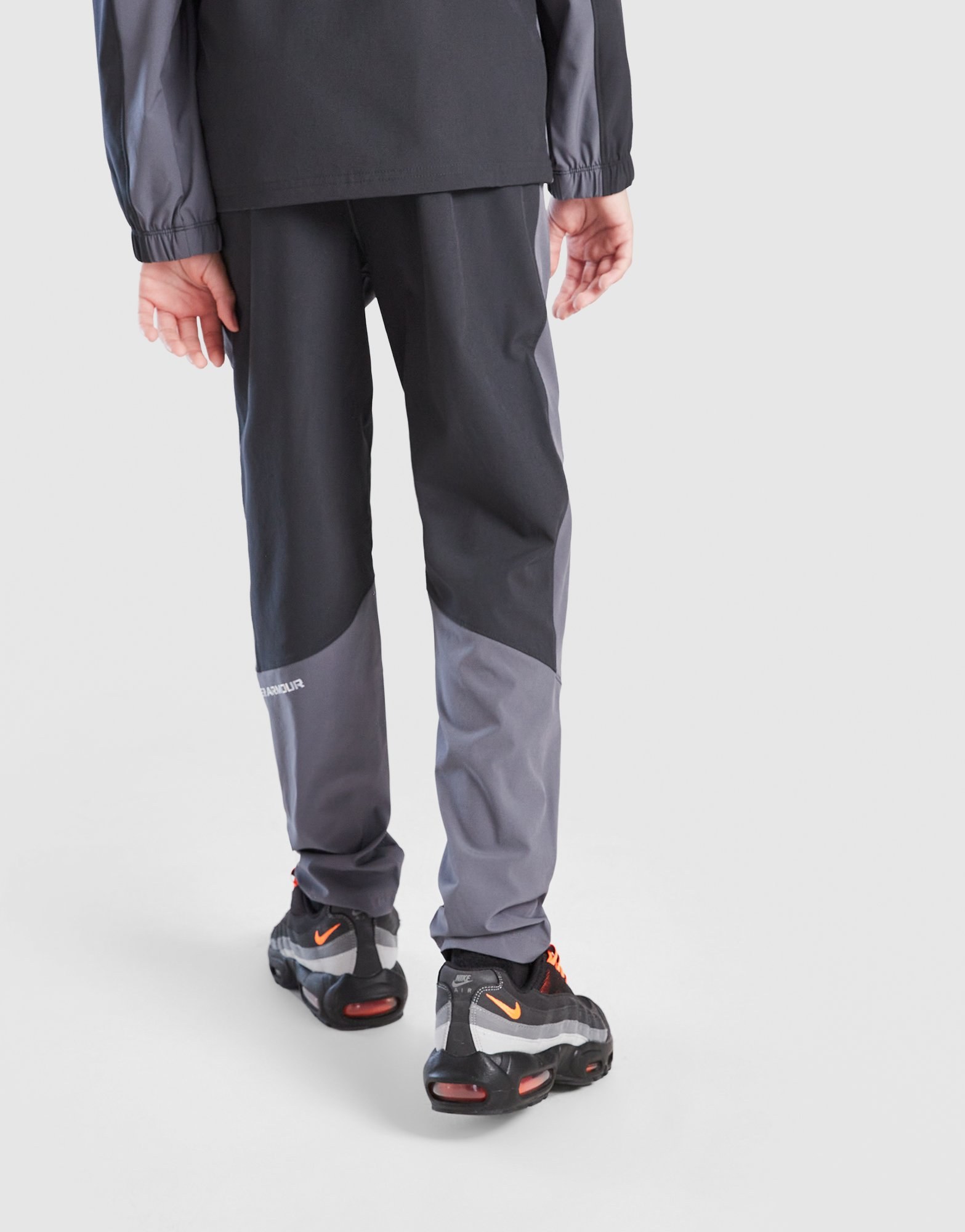 Under Armour Storm Hybrid Woven Trainingshose Kinder