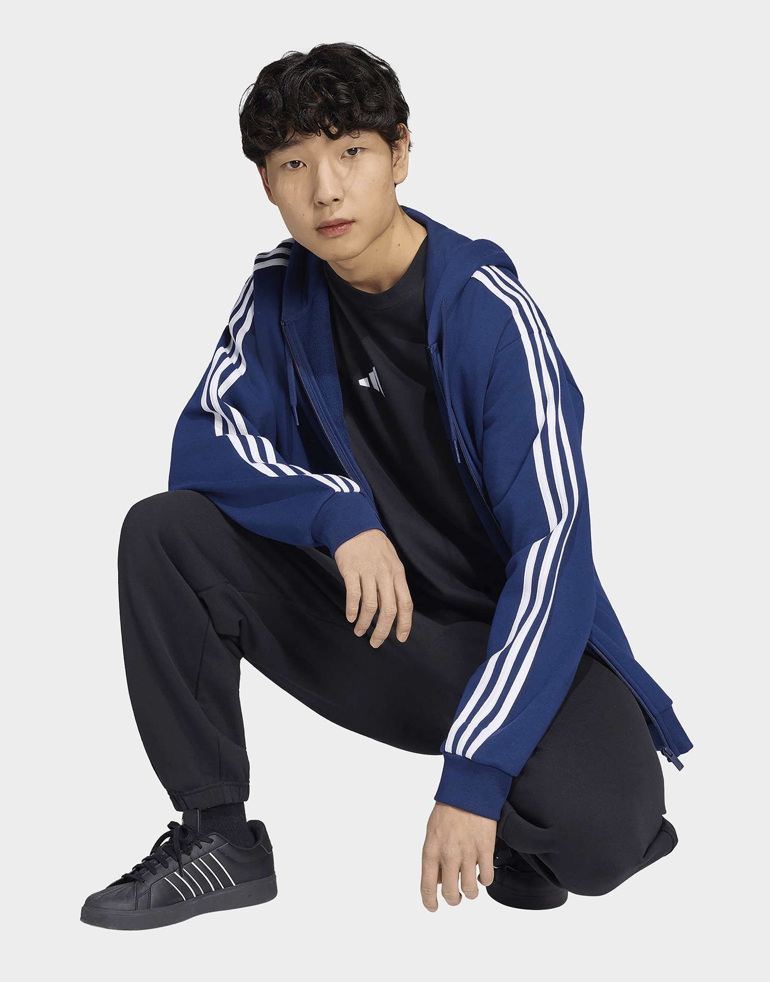 adidas Essentials 3-Streifen French Terry Kapuzenjacke