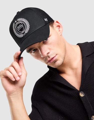 Unlike Humans Crest Trucker Cap