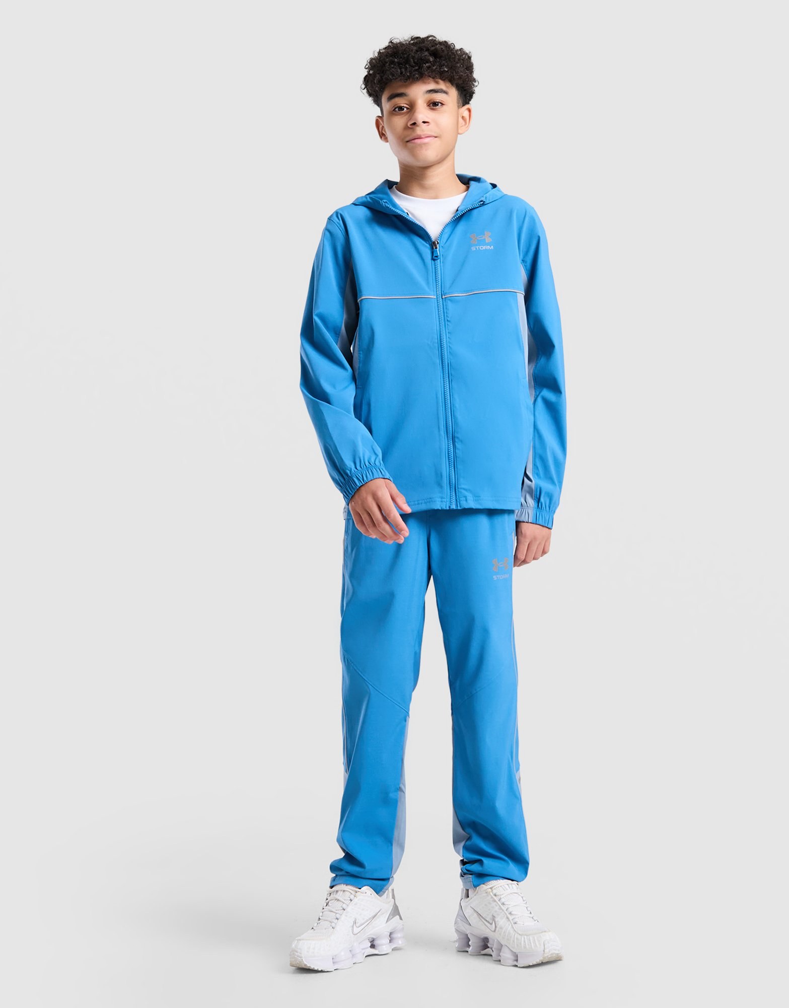 Under Armour Storm Hybrid Woven Trainingshose Kinder