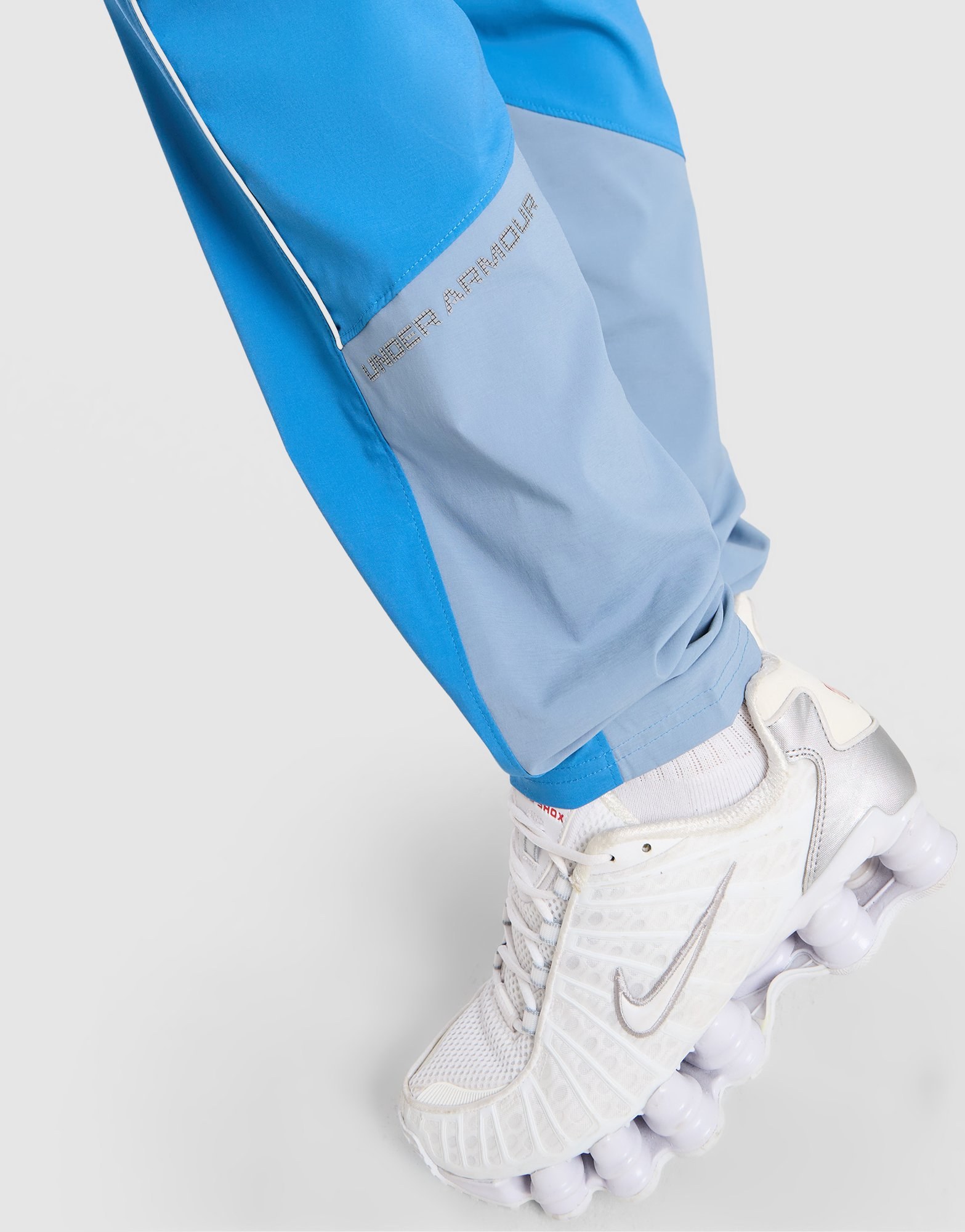 Under Armour Storm Hybrid Woven Trainingshose Kinder